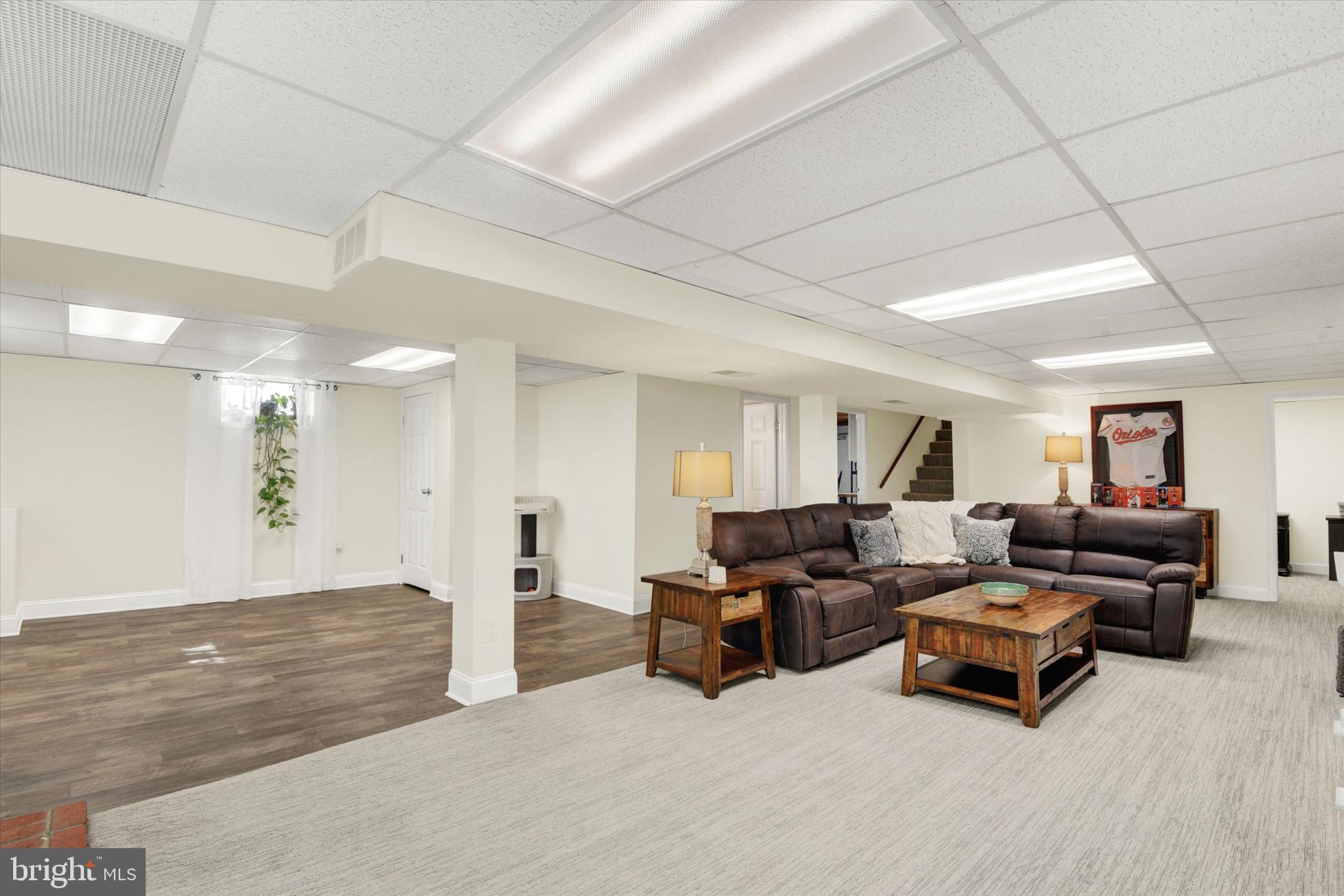 2116 Paddock Lane Finksburg, MD 21048 - Photo 20 of 35 a living room with furniture and a wooden floor
