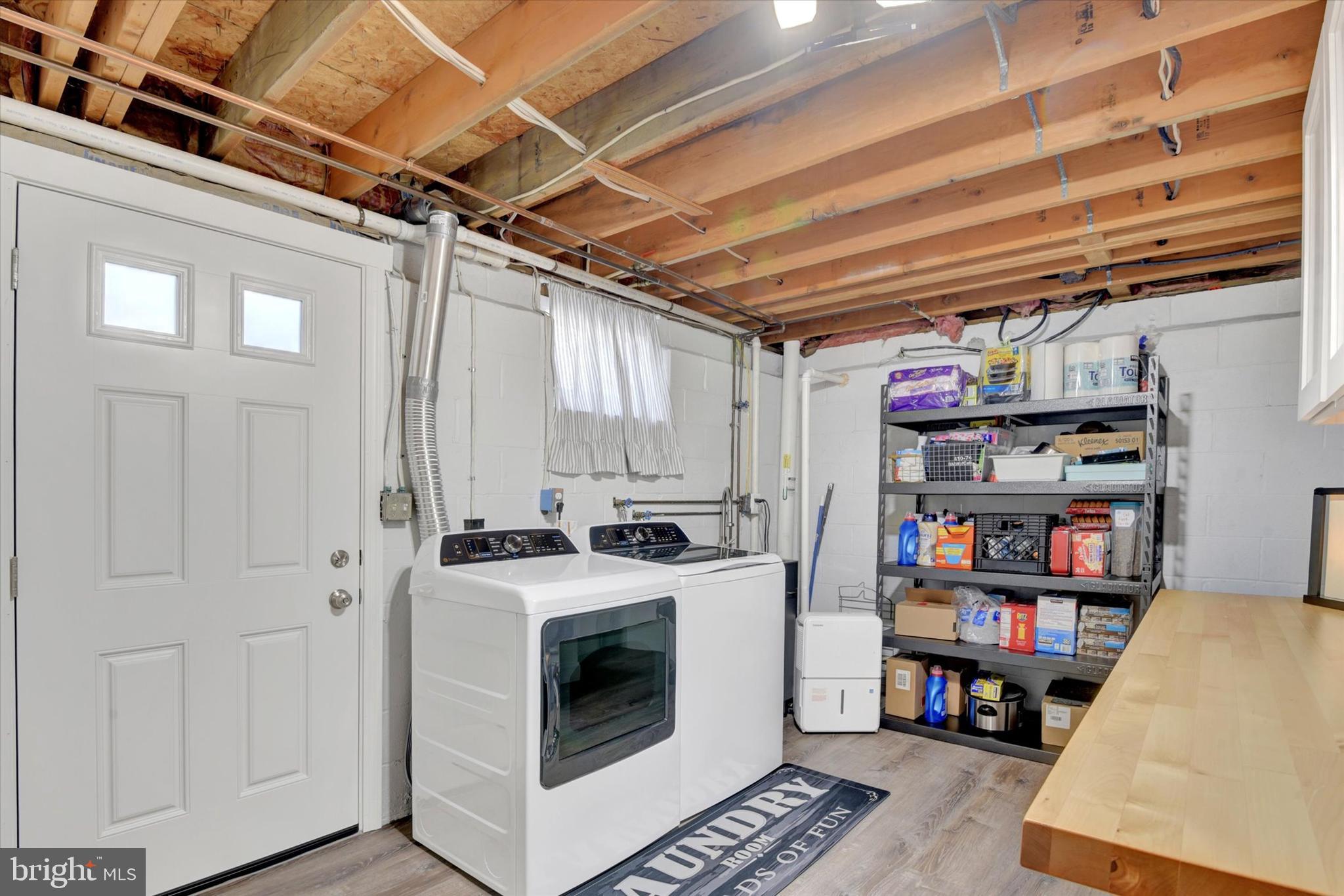 2116 Paddock Lane Finksburg, MD 21048 - Photo 22 of 35 a utility room with dryer and washer