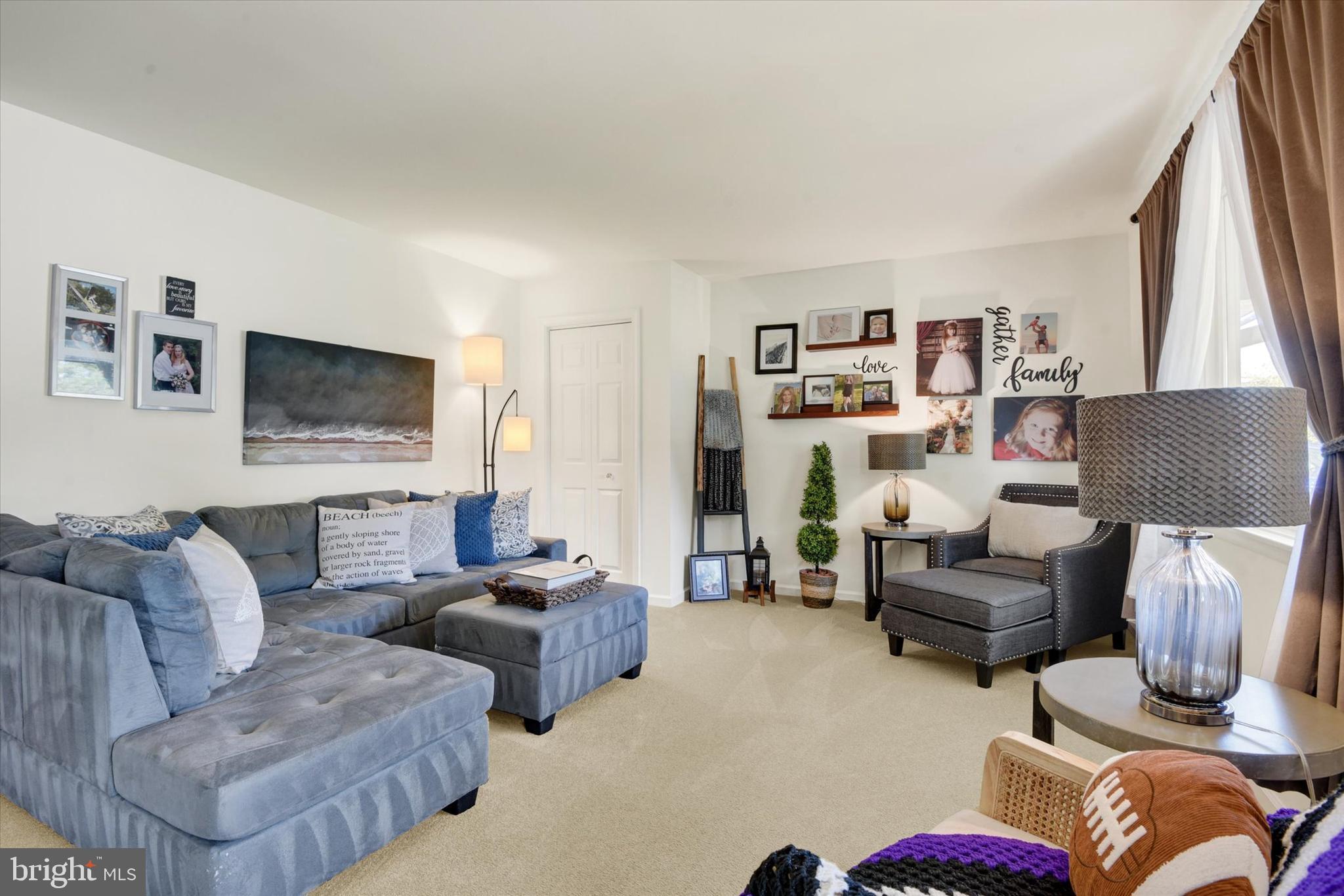 2116 Paddock Lane Finksburg, MD 21048 - Photo 3 of 35 a living room with furniture and a flat screen tv