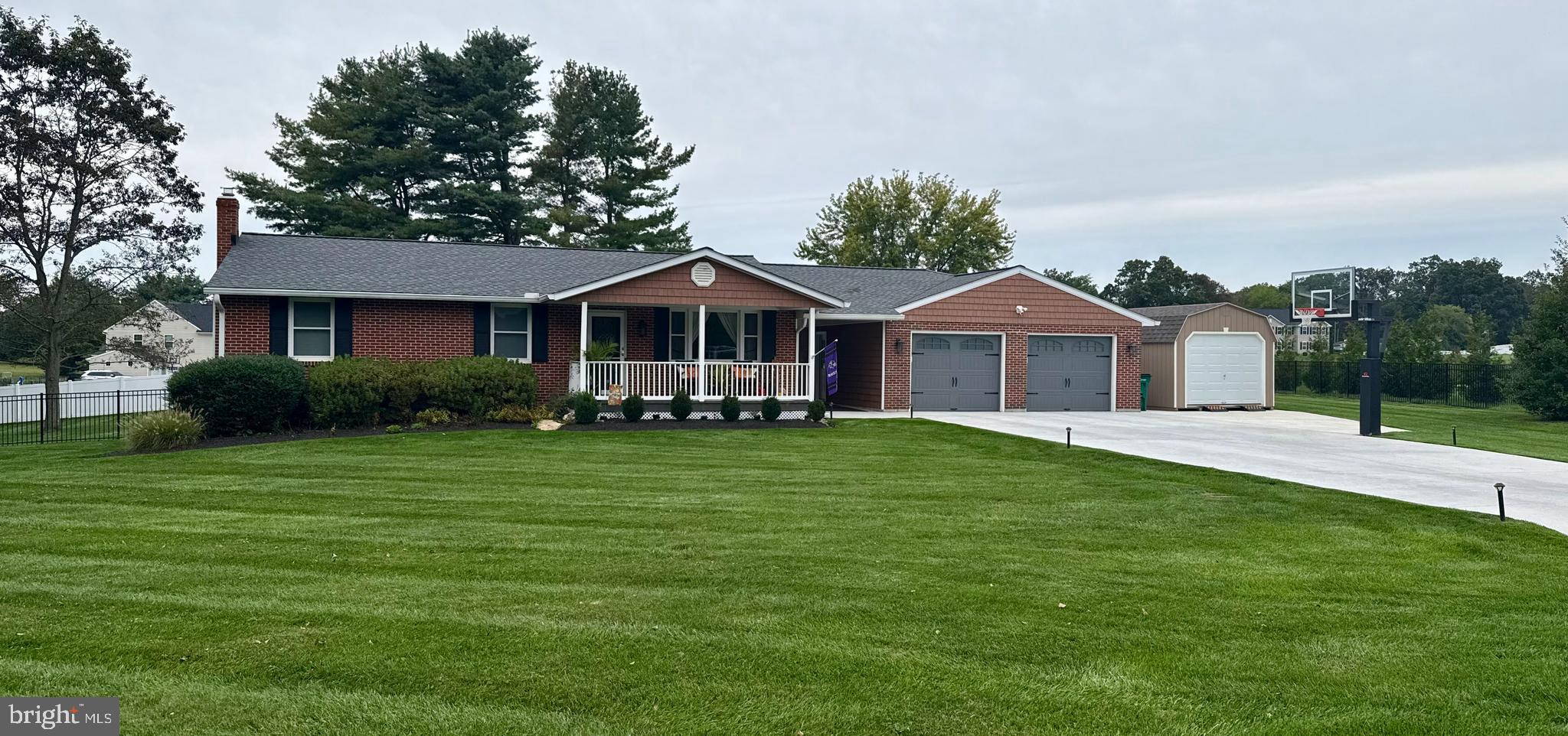 2116 Paddock Lane Finksburg, MD 21048 - Photo 31 of 35 a front view of a house with a garden