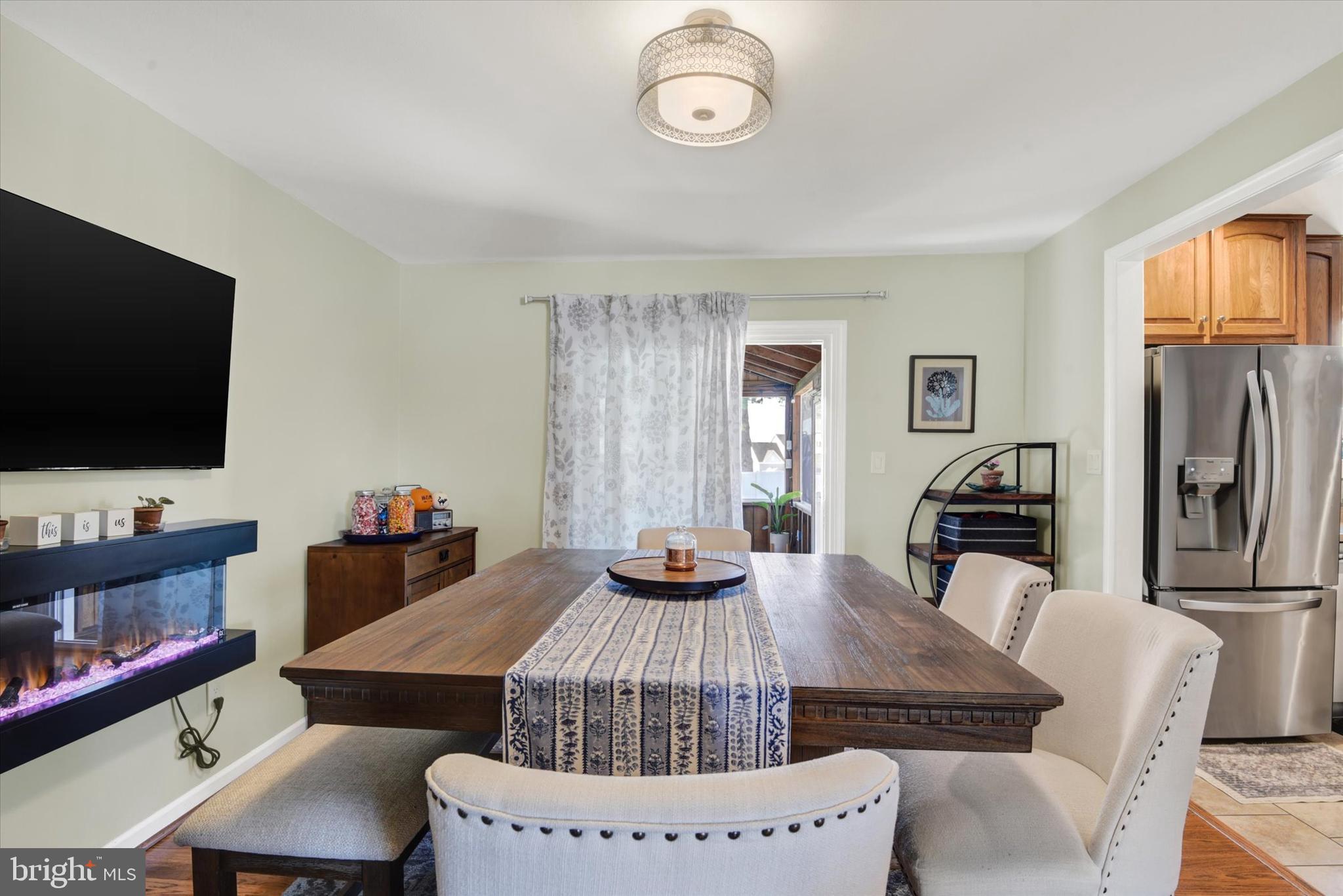 2116 Paddock Lane Finksburg, MD 21048 - Photo 5 of 35 a living room with furniture and a flat screen tv