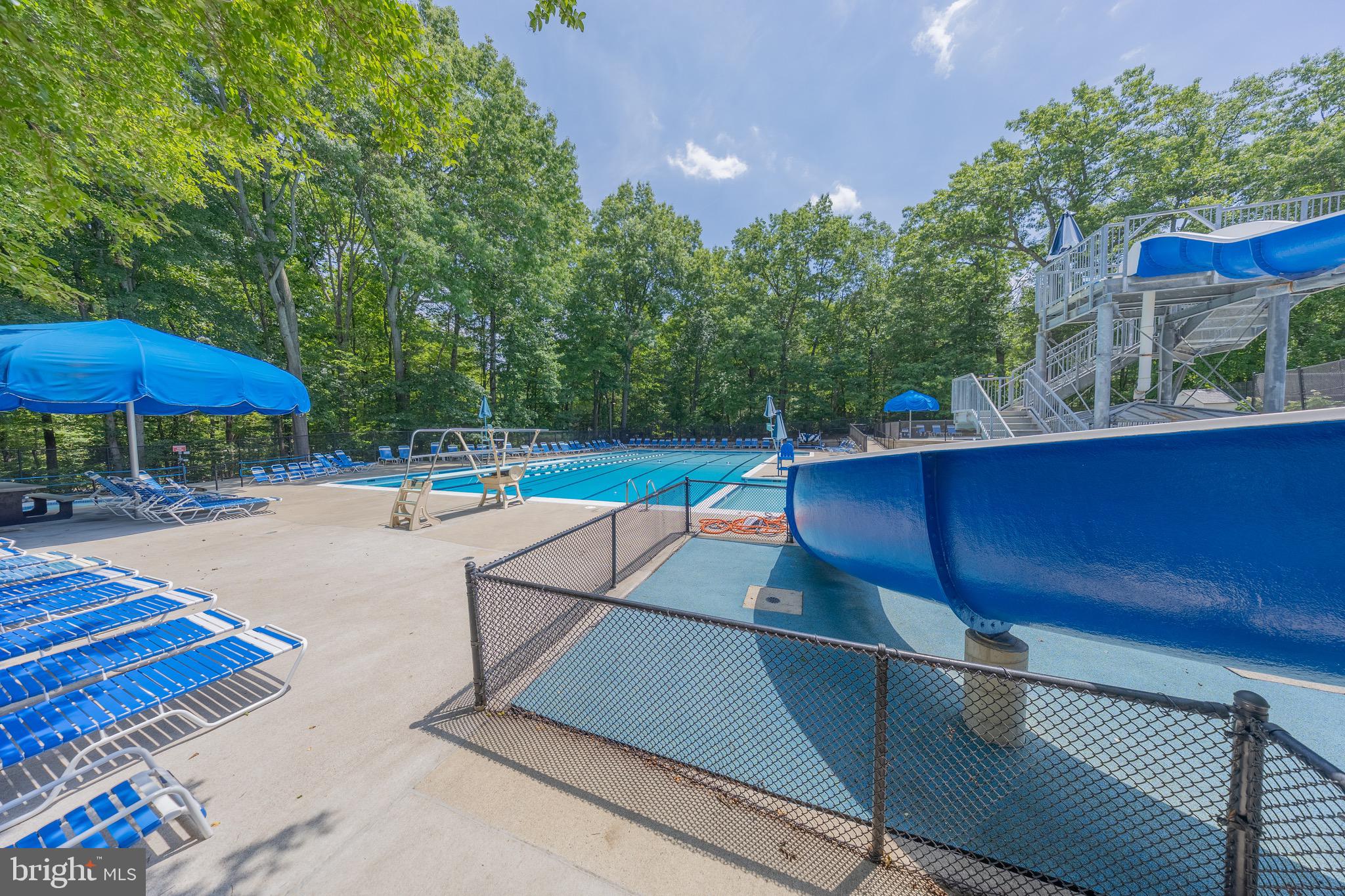 11714 Dry River Court Reston, VA 20191 - Photo 15 of 18 a view of a tennis ground with large trees