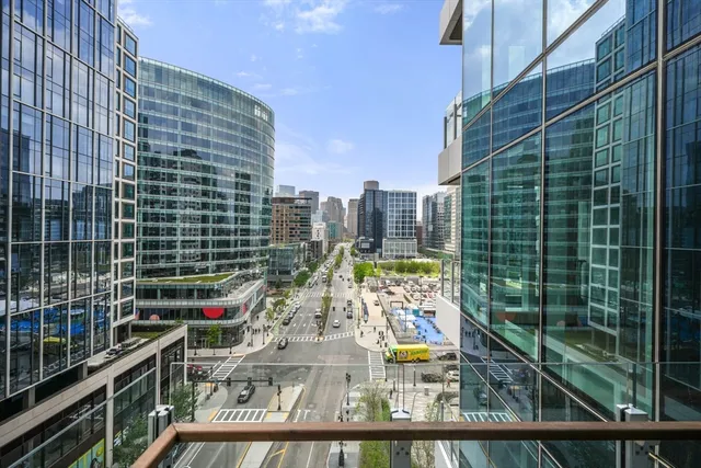 a view of swimming pool from a balcony