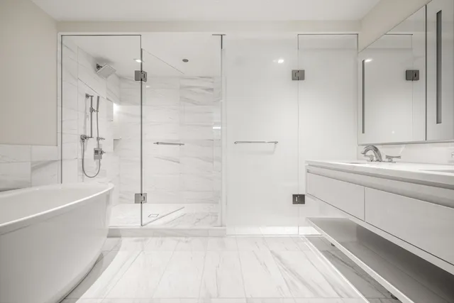 a bathroom with a bathtub and a sink