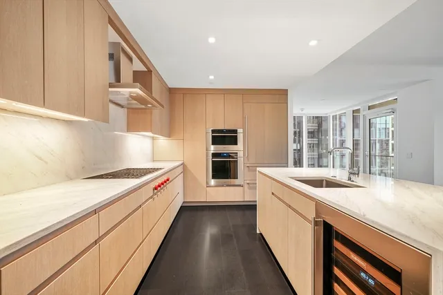 a kitchen with a stove and a sink