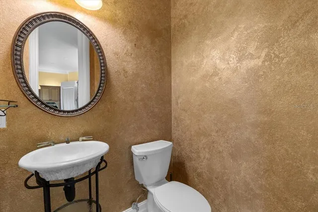 a bathroom with a bathtub and window