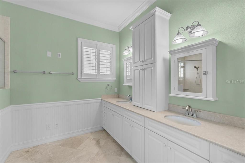 4301 Vasco Street Punta Gorda, FL 33950 - Photo 20 of 53 a bathroom with a bathtub sink and mirror