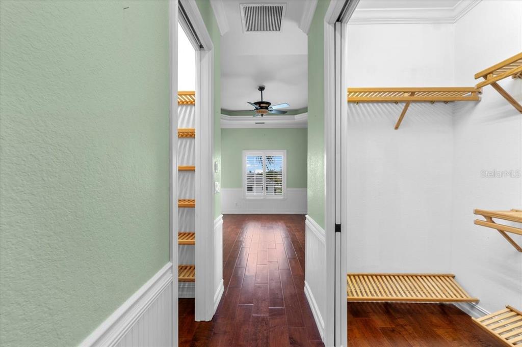 4301 Vasco Street Punta Gorda, FL 33950 - Photo 21 of 53 a view of a hallway view with wooden floor and staircase