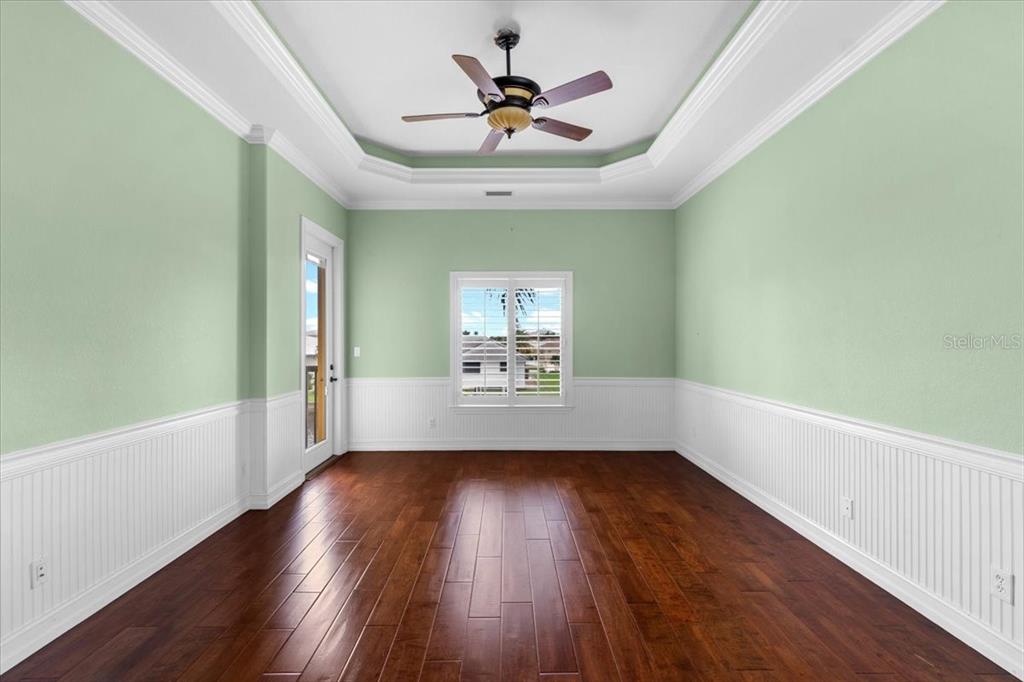 4301 Vasco Street Punta Gorda, FL 33950 - Photo 23 of 53 wooden floor in an empty room with a window