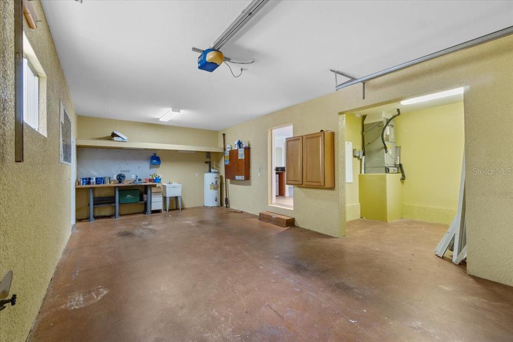 4301 Vasco Street Punta Gorda, FL 33950 - Photo 36 of 53 a view of a livingroom with furniture and a refrigerator