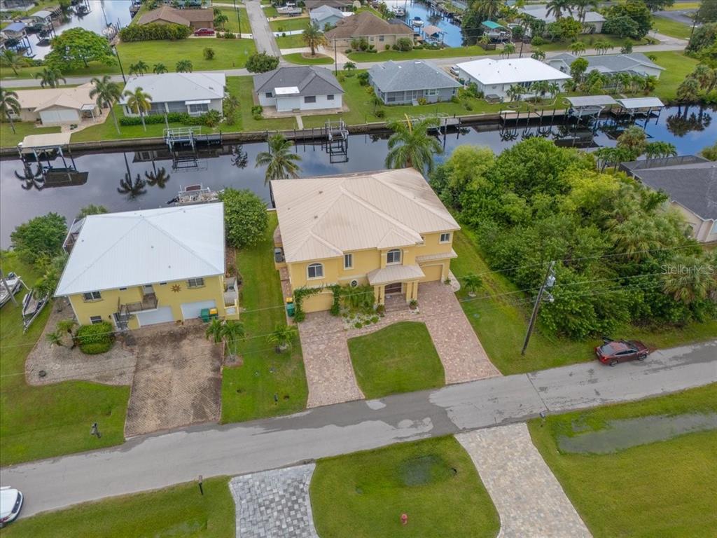 4301 Vasco Street Punta Gorda, FL 33950 - Photo 52 of 53 an aerial view of a house with yard swimming pool and outdoor seating