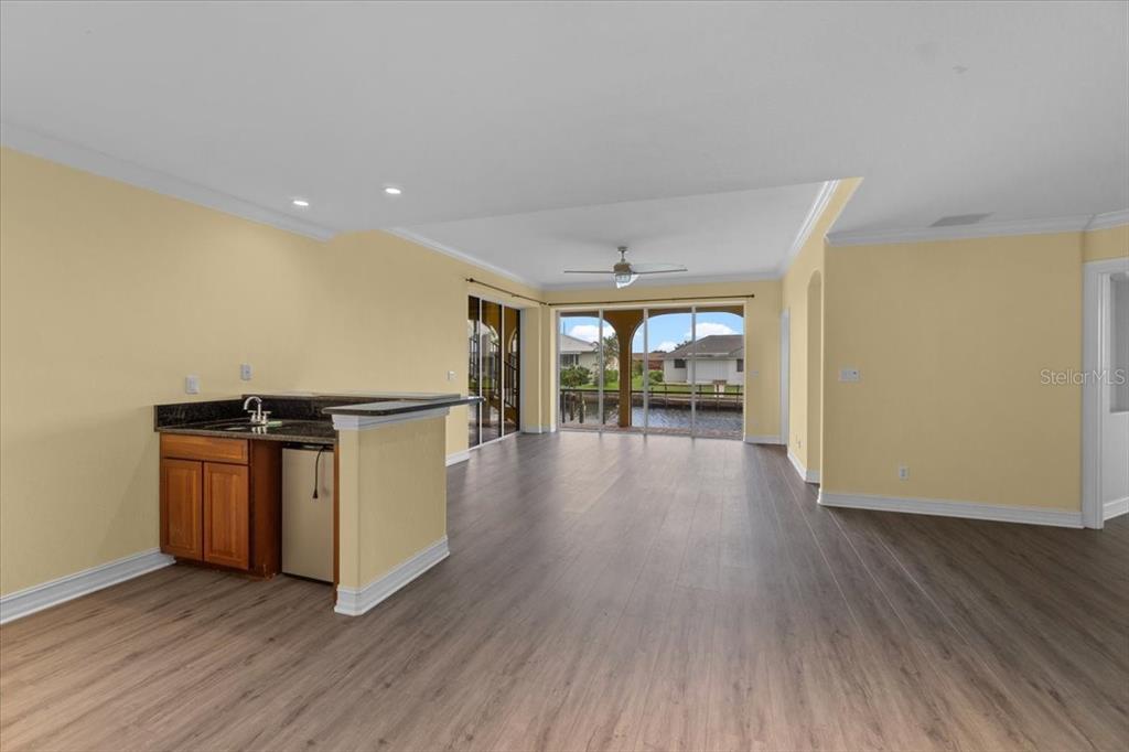 4301 Vasco Street Punta Gorda, FL 33950 - Photo 6 of 53 a view of a room with wooden floor