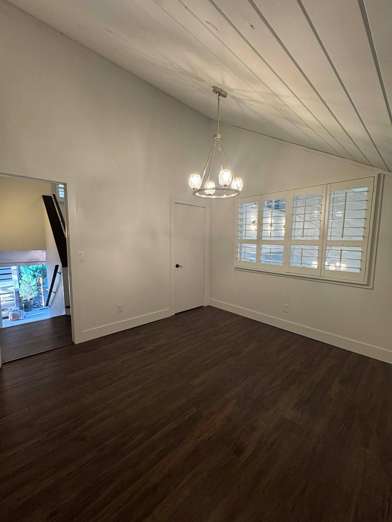 500 Marina Road Murphy, NC 28906 - Photo 24 of 57 an empty room with wooden floor and windows