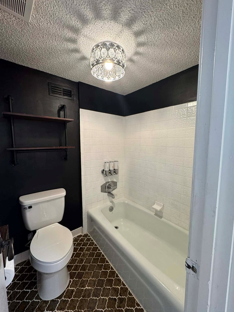 500 Marina Road Murphy, NC 28906 - Photo 44 of 57 a bathroom with a toilet a sink and bathtub