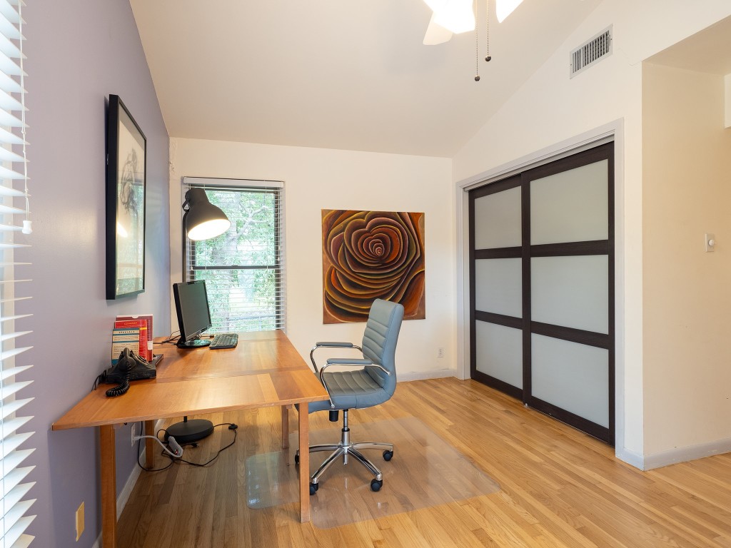 4617 Finley Drive Austin, TX 78731 - Photo 22 of 36 Office space featuring vaulted ceiling, wood finished floors, and ceiling fan
