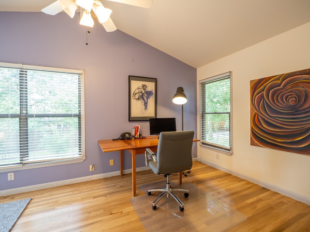 4617 Finley Drive Austin, TX 78731 - Photo 23 of 36 Home office featuring light wood-style floors, lofted ceiling, and ceiling fan
