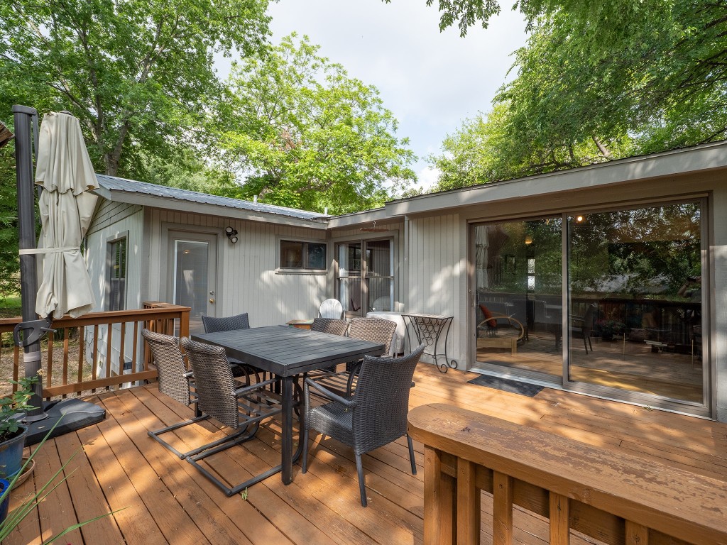 4617 Finley Drive Austin, TX 78731 - Photo 29 of 36 Wooden deck with outdoor dining area