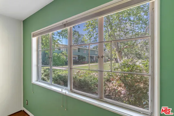 a view of a room and window