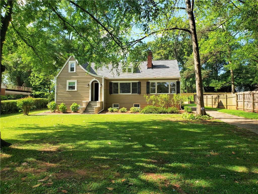2923 East Pharr Road Atlanta, GA 30317 - Photo 1 of 1 a front view of a house with a garden