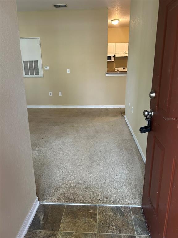 823 Grand Regency Point, Unit 102 Altamonte Springs, FL 32714 - Photo 3 of 12 view of a room with door