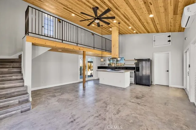 a view of an empty room with glass door