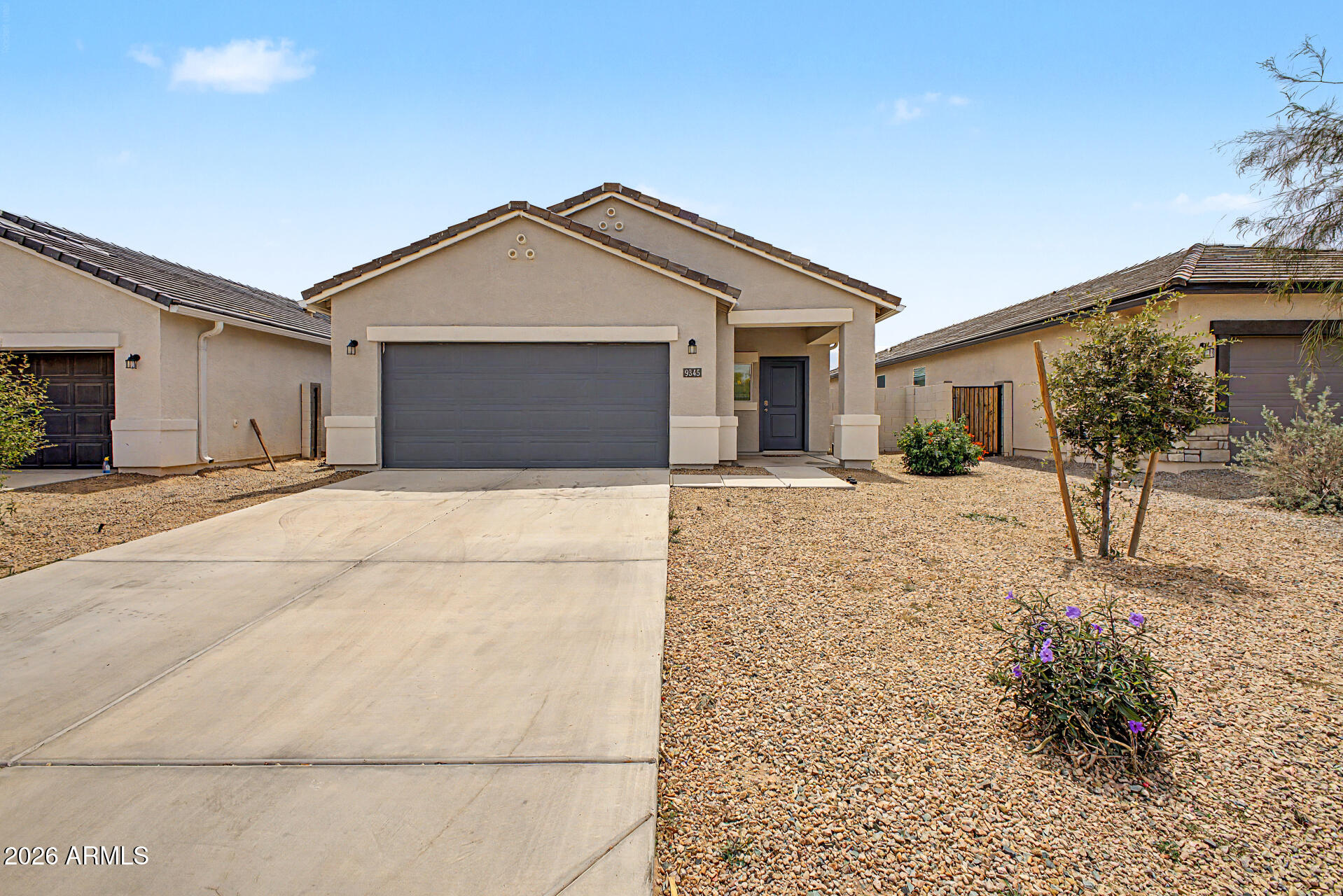 9345 Tangerine Road Florence, AZ 85132 - Photo 1 of 30 a view of a house with a yard