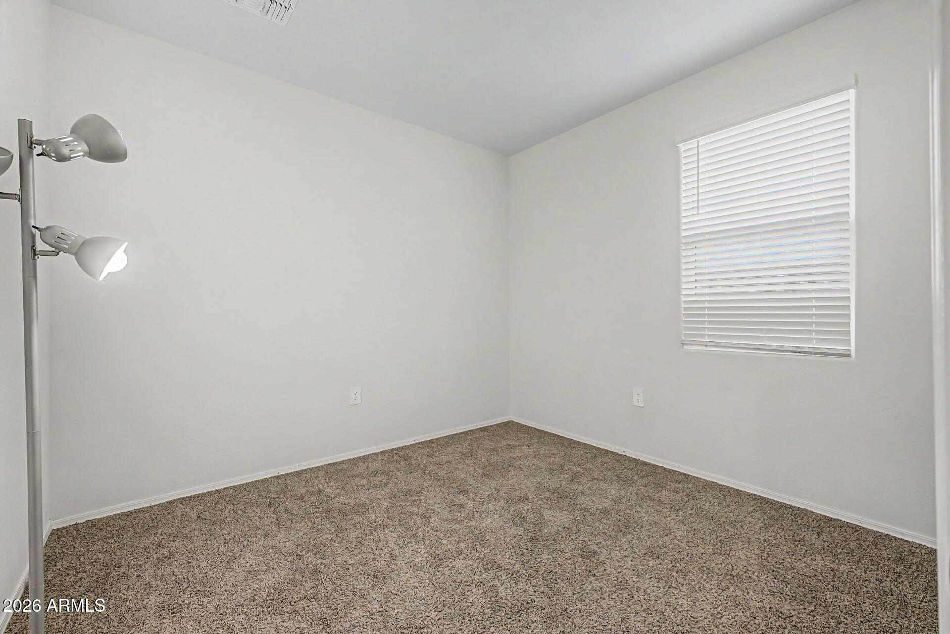 9345 Tangerine Road Florence, AZ 85132 - Photo 22 of 30 a view of a small space with a window