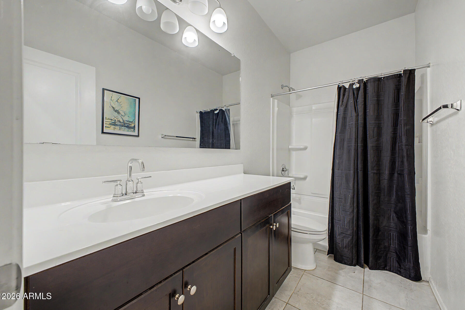 9345 Tangerine Road Florence, AZ 85132 - Photo 24 of 30 a bathroom with a sink and a mirror