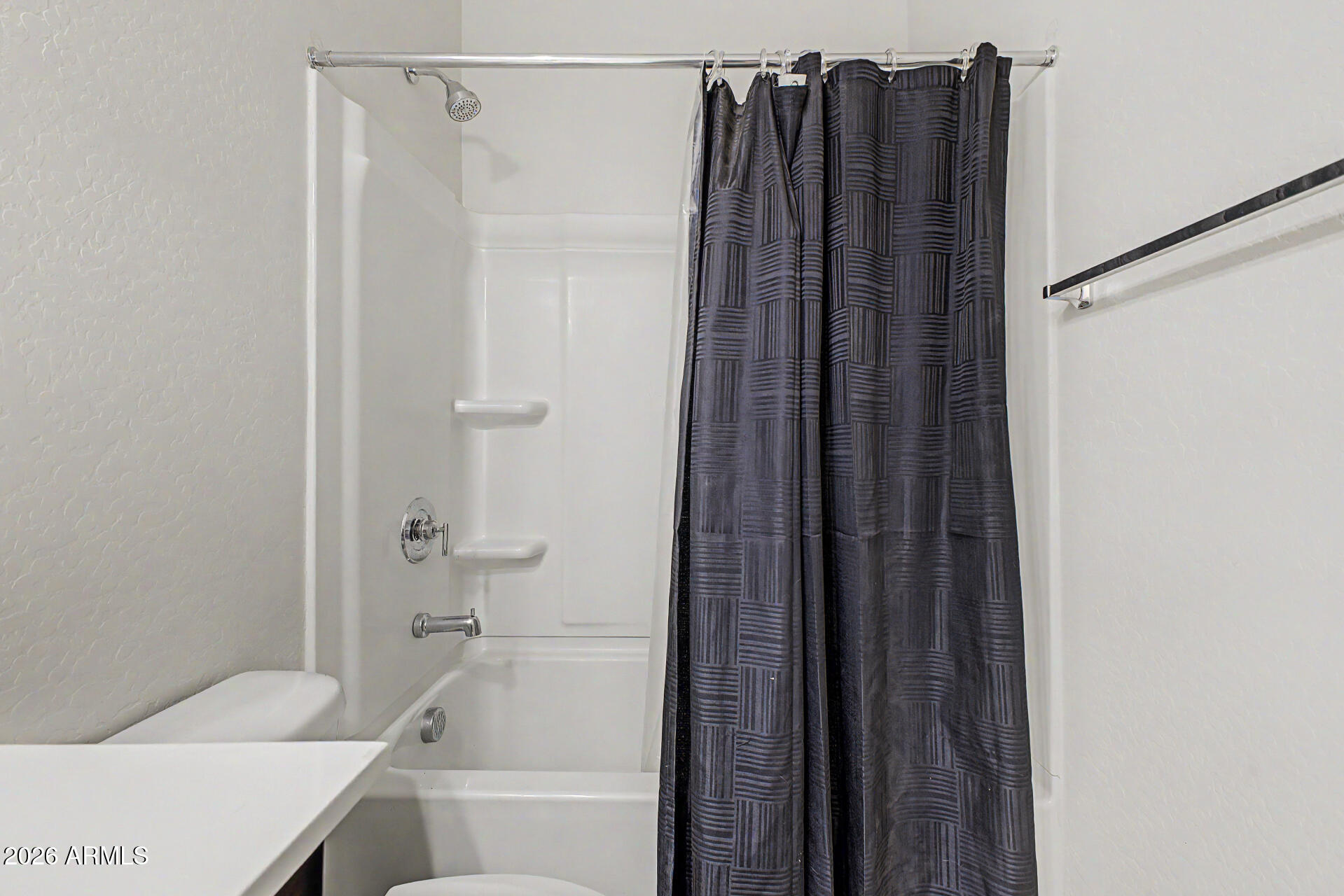 9345 Tangerine Road Florence, AZ 85132 - Photo 25 of 30 a bathroom with a shower and a sink