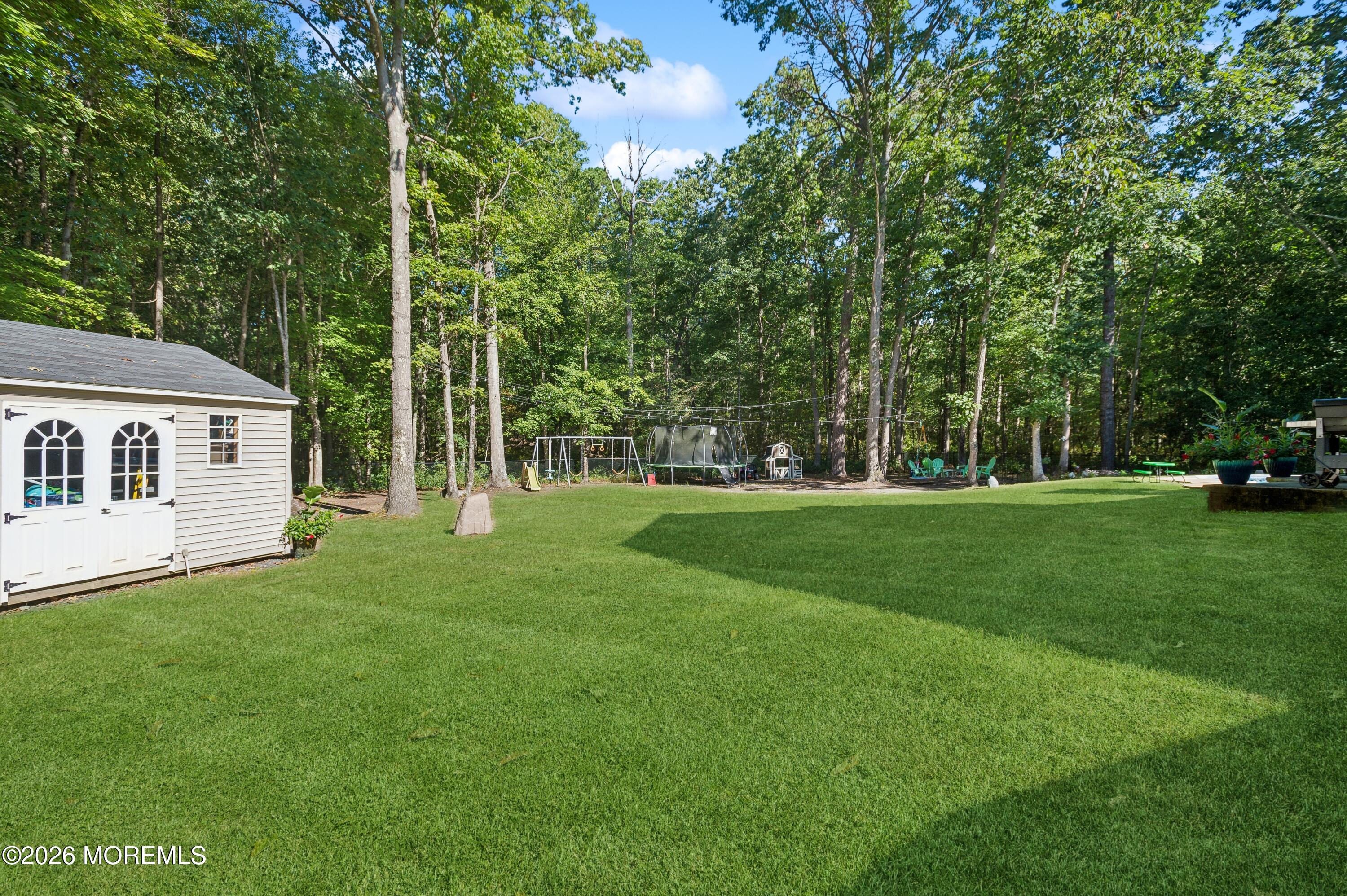 5 Ironwood Court Jackson, NJ 08527 - Photo 50 of 62 35_5IronwoodCt_26001_BackYard_HiRes