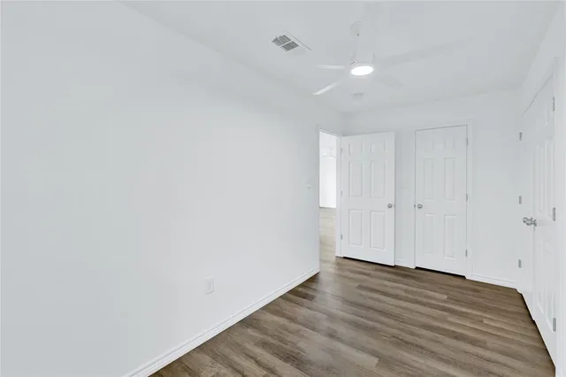 a bathroom with a sink a vanity and a toilet