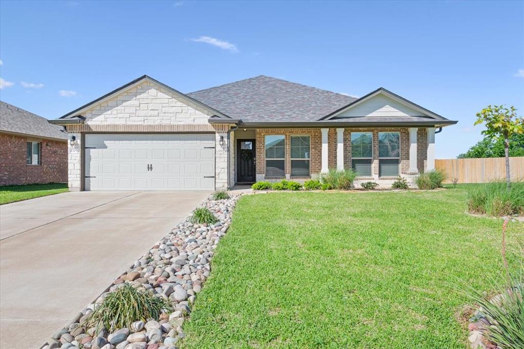 6301 Elephant Butte Drive Waco, TX 76708 - Photo 1 of 1 Ranch-style home featuring driveway, fence, brick siding, an attached garage, and a front yard