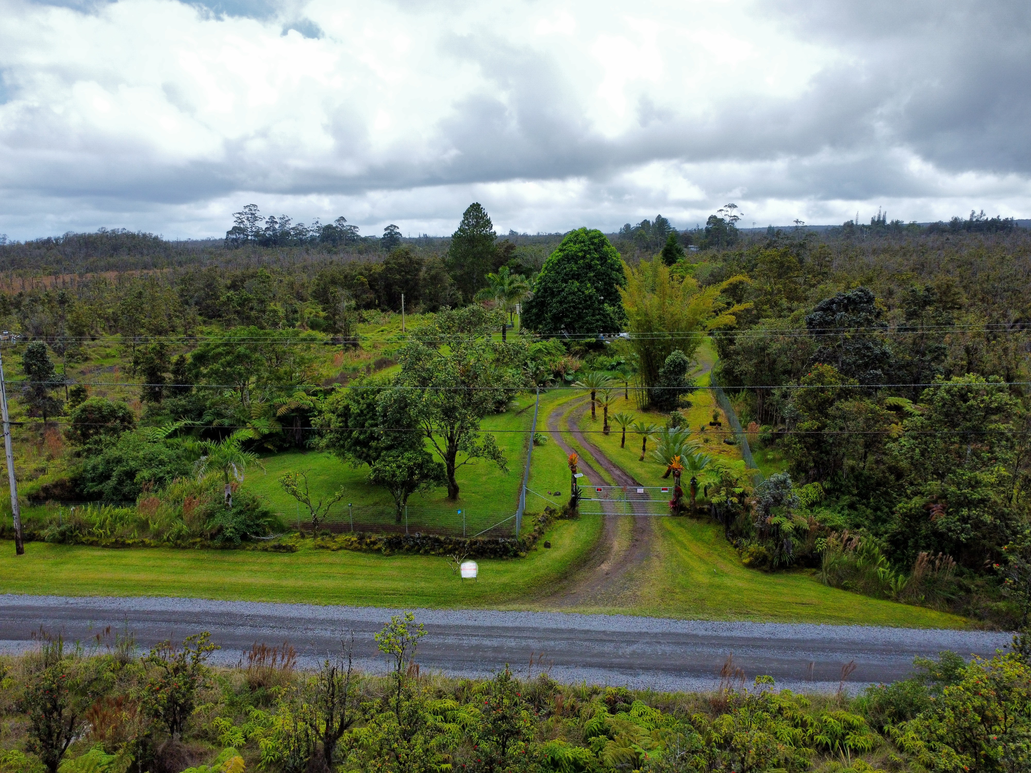 11-2485 Omeka Road Mountain View, HI 96771 - Photo 23 of 30 an aerial view of a golf course with a garden