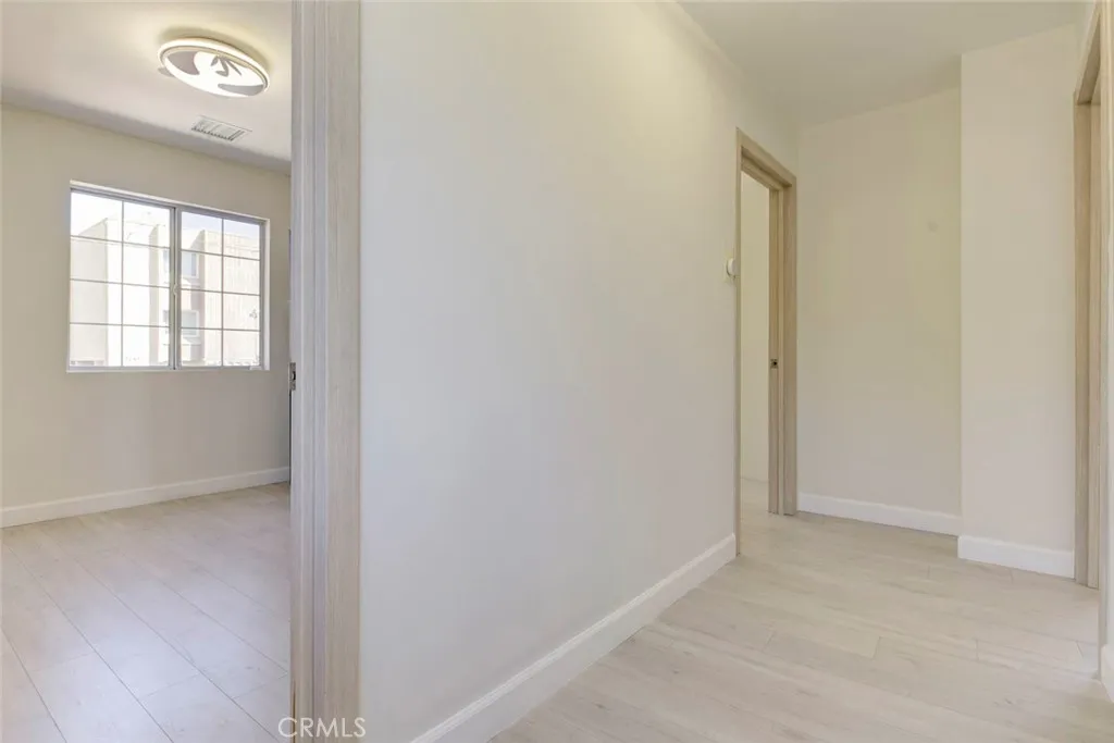 7044 Greeley Street Tujunga, CA 91042 - Photo 16 of 27 an empty room with windows