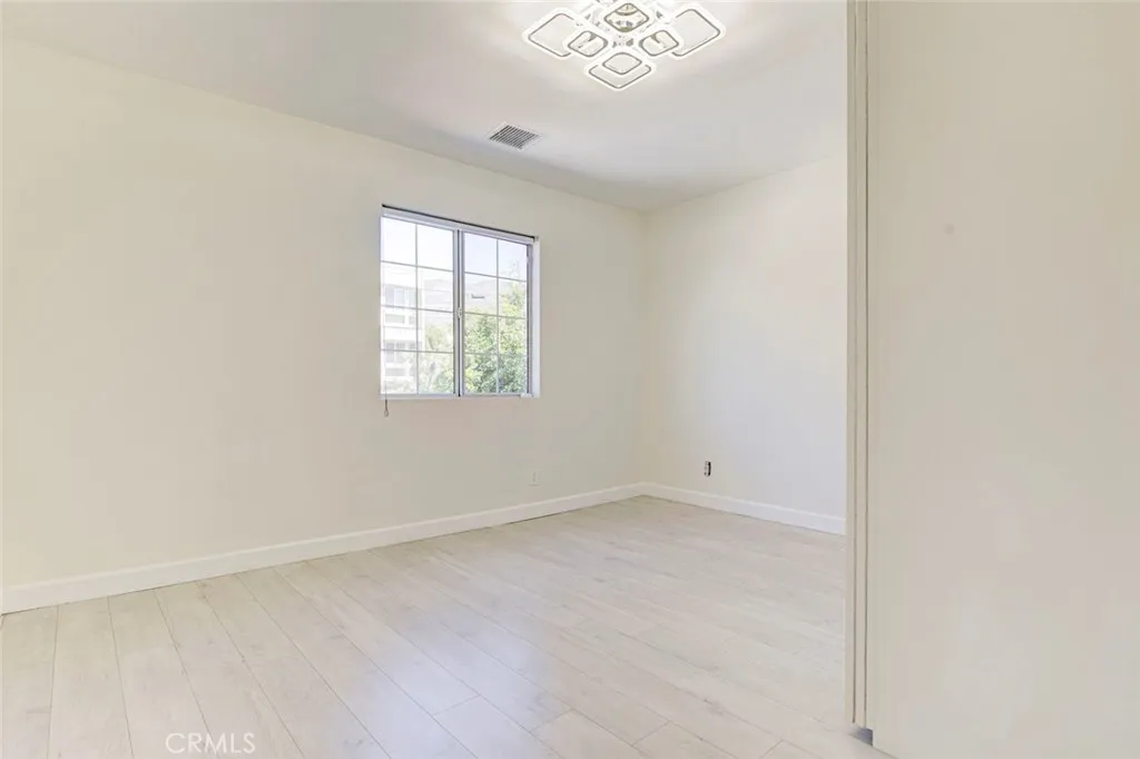 7044 Greeley Street Tujunga, CA 91042 - Photo 22 of 27 a view of an empty room with a window