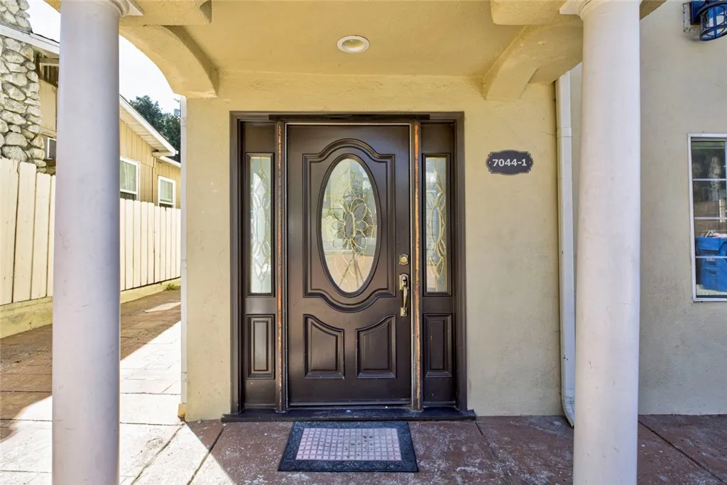 7044 Greeley Street Tujunga, CA 91042 - Photo 4 of 27 a front view of a house with garden