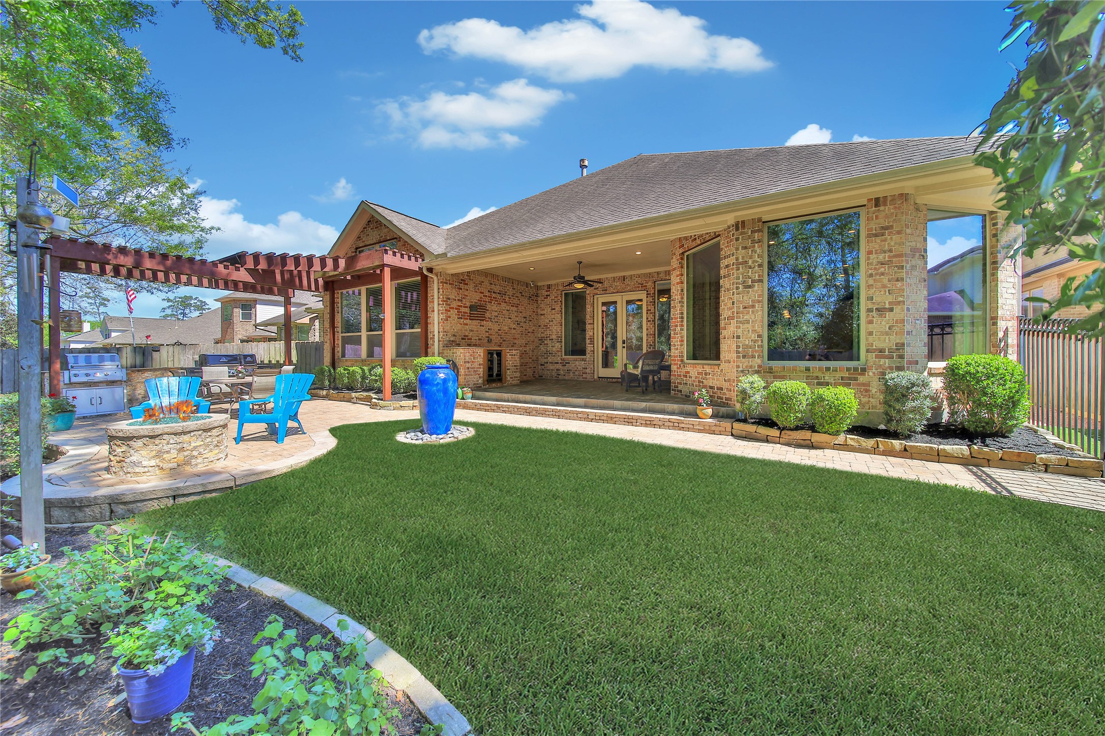 3234 Explorer Way Conroe, TX 77301 - Photo 43 of 46 Enjoy a private backyard setting with mature landscaping and peaceful views of the protected nature area beyond