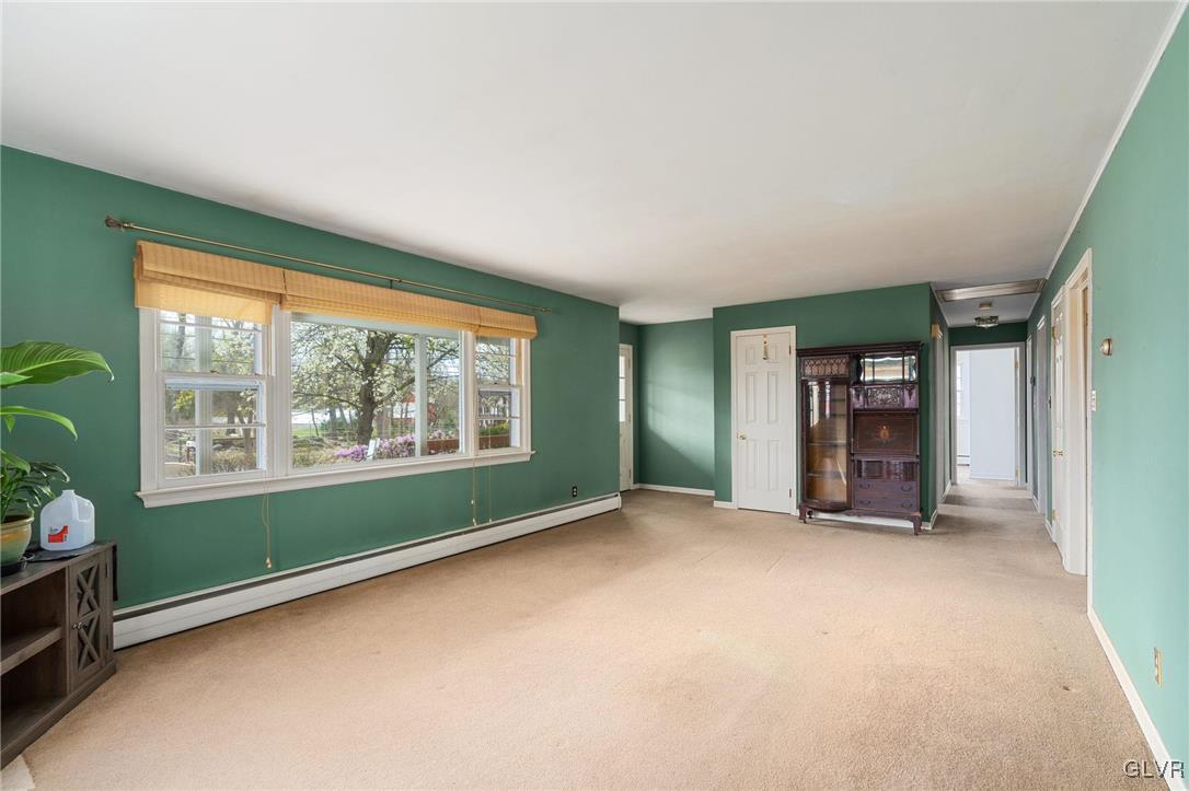 1675 Salem Road Quakertown, PA 18951 - Photo 16 of 34 an empty room with large window and a livingroom