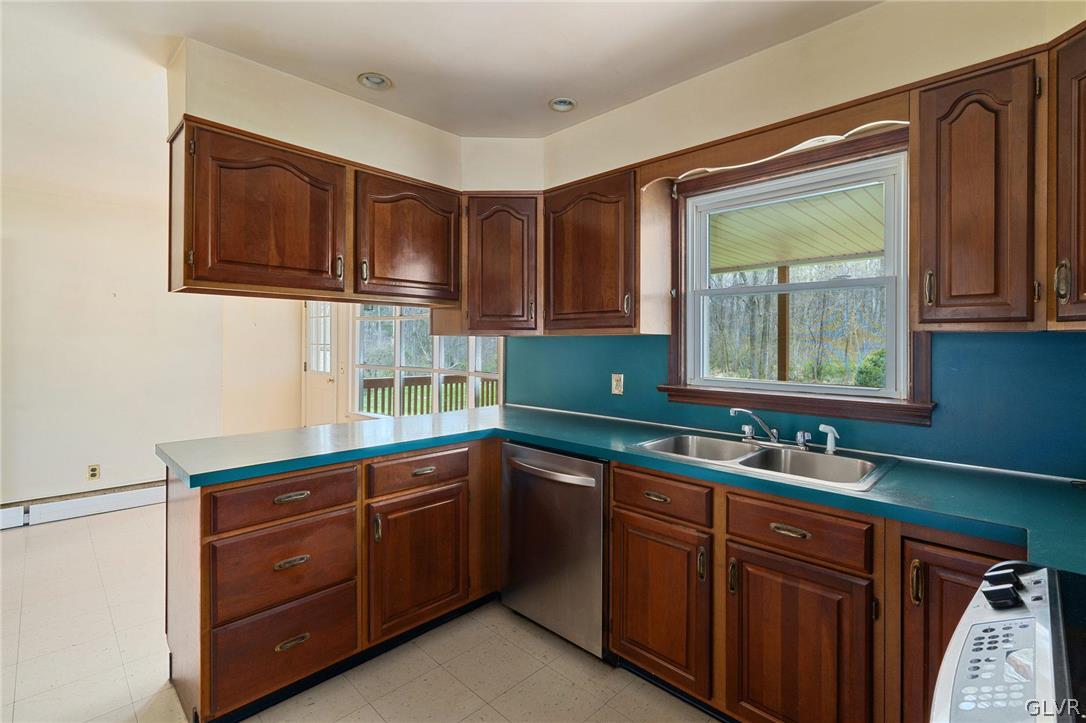 1675 Salem Road Quakertown, PA 18951 - Photo 22 of 34 a kitchen with a sink stove and microwave