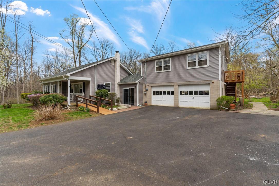 1675 Salem Road Quakertown, PA 18951 - Photo 3 of 34 a view of a house with backyard and porch
