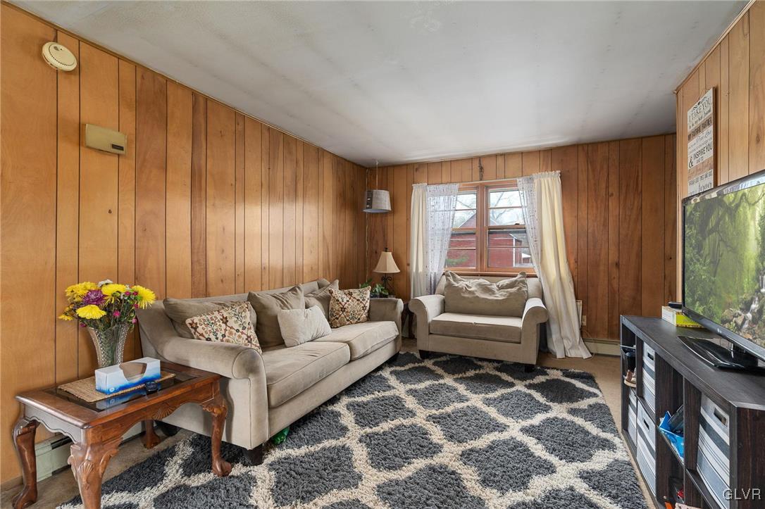 1675 Salem Road Quakertown, PA 18951 - Photo 33 of 34 a living room with furniture and a flat screen tv