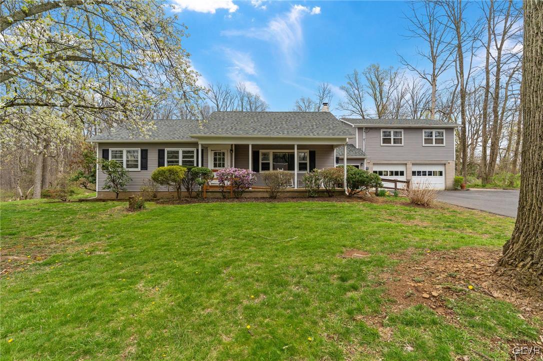 1675 Salem Road Quakertown, PA 18951 - Photo 4 of 34 a view of a house with a yard and sitting area