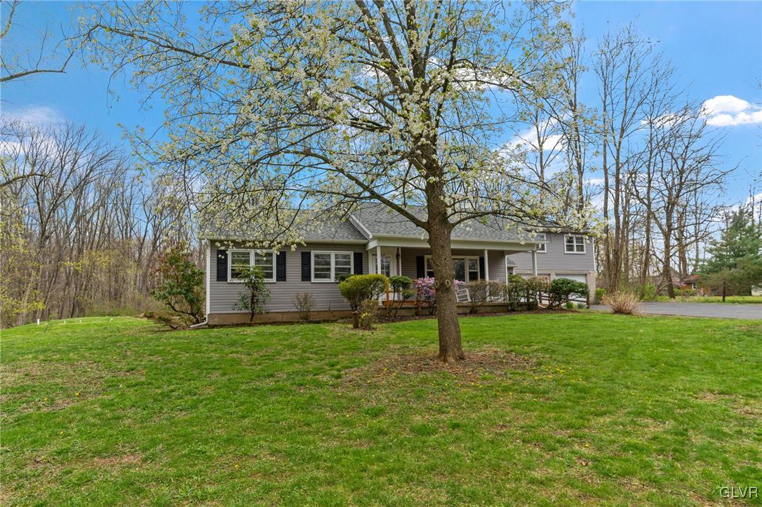 1675 Salem Road Quakertown, PA 18951 - Photo 5 of 34 a view of a house with a yard