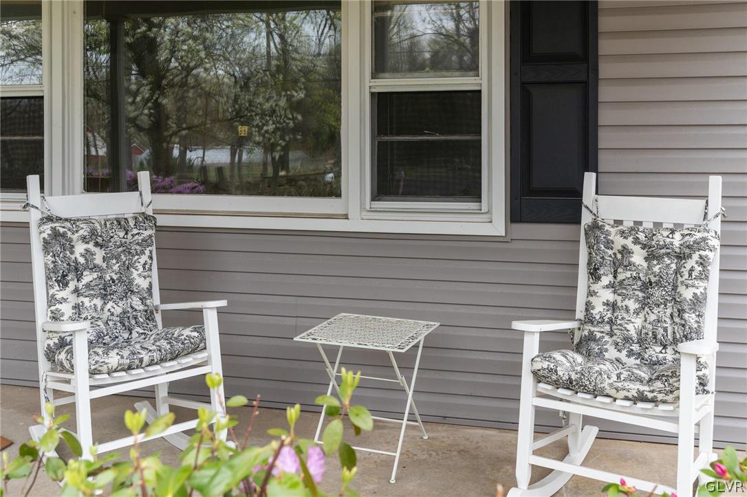1675 Salem Road Quakertown, PA 18951 - Photo 7 of 34 a view of front door of house with seating space