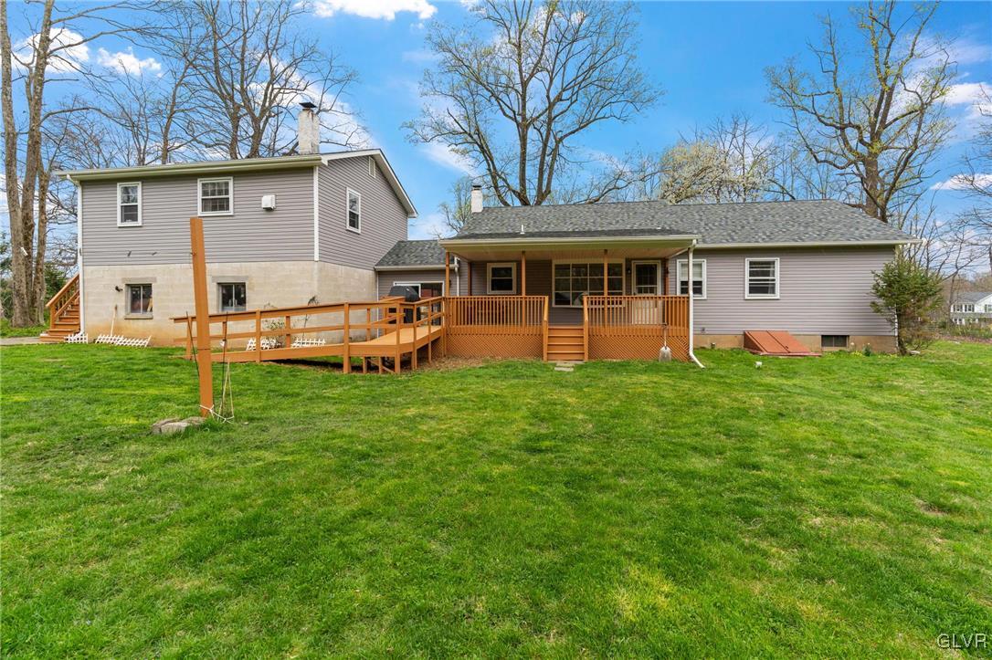 1675 Salem Road Quakertown, PA 18951 - Photo 10 of 34 a front view of a house with a yard and trees