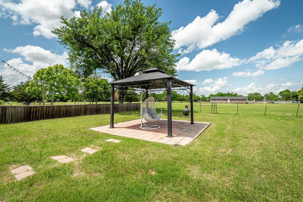 10 Estates Road Lucas, TX 75002 - Photo 35 of 39 View of yard featuring a gazebo and a patio