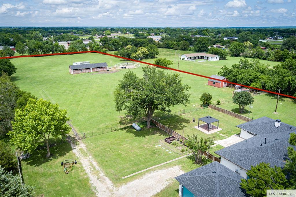 10 Estates Road Lucas, TX 75002 - Photo 36 of 39 Aerial view of property's location featuring property boundaries highlighted and a tree filled landscape