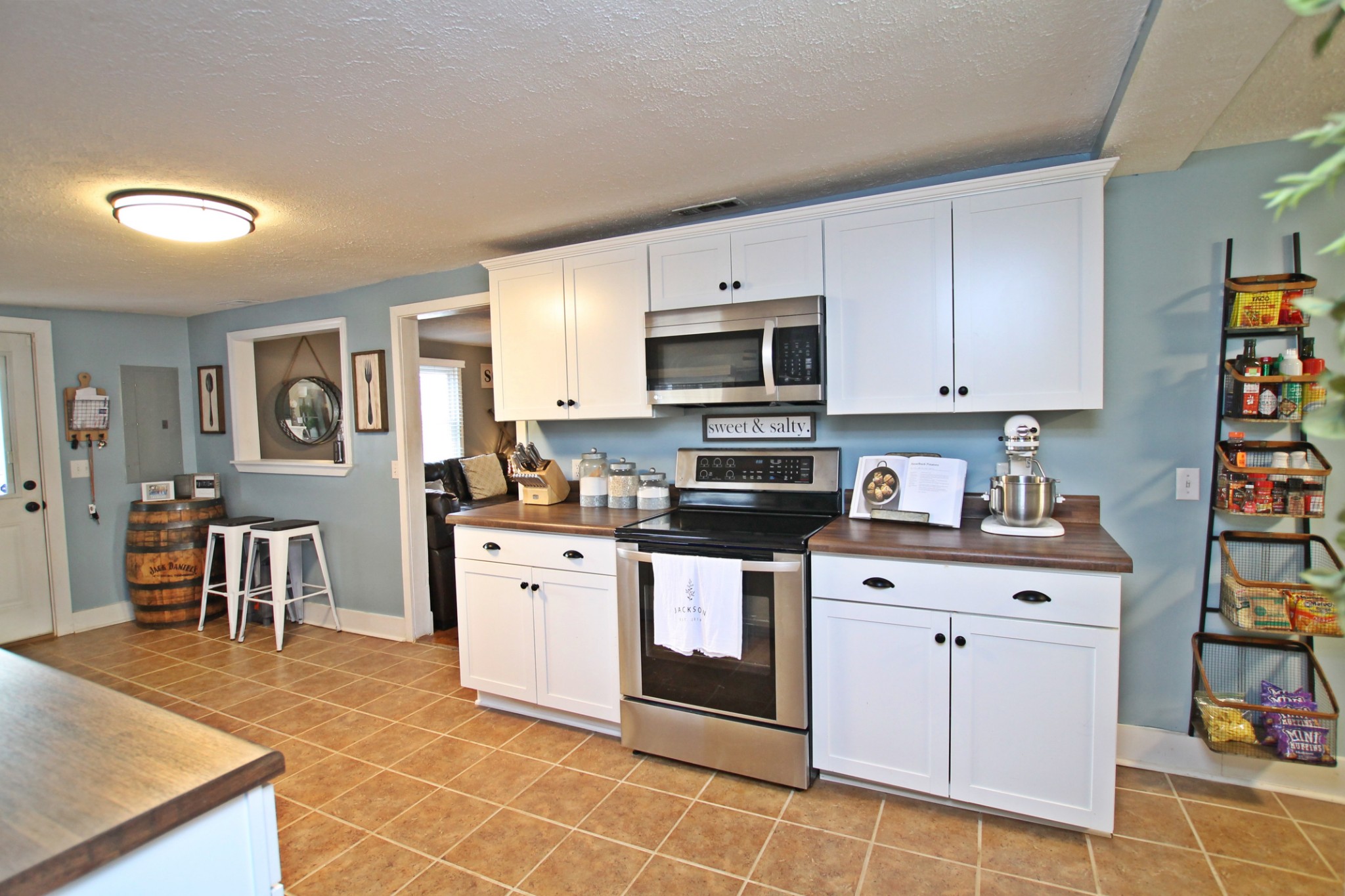 5898 Campbell Road Cross Plains, TN 37049 - Photo 14 of 49 a kitchen with cabinets stainless steel appliances and a counter top space