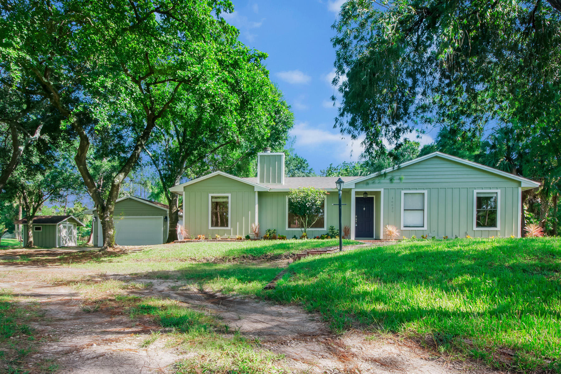 16629 93rd Road North Loxahatchee, FL 33470 - Photo 1 of 38 1 Exterior Front 1.1 LR1_5467-Edit