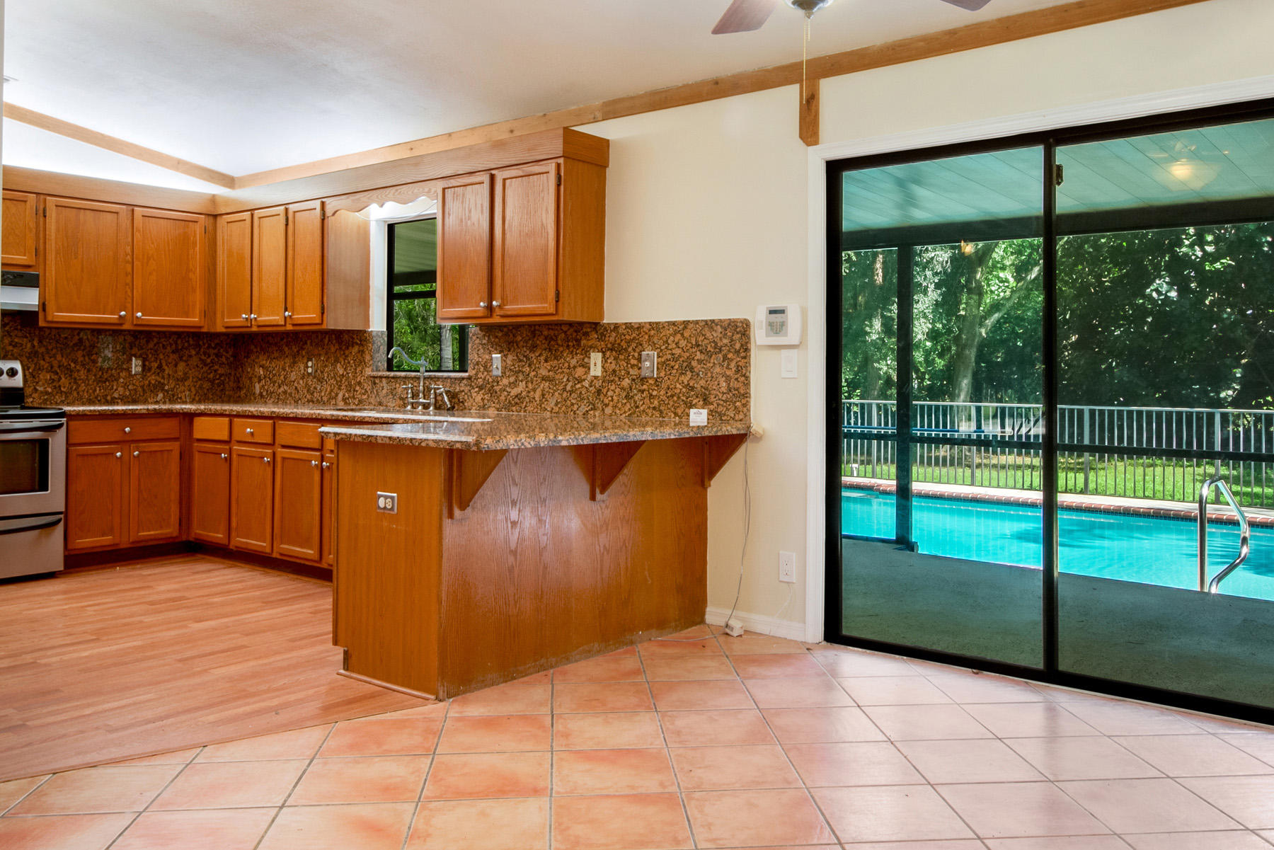 16629 93rd Road North Loxahatchee, FL 33470 - Photo 12 of 38 7 Kitchen Dinette Counter 1 LR1_5576-Edi